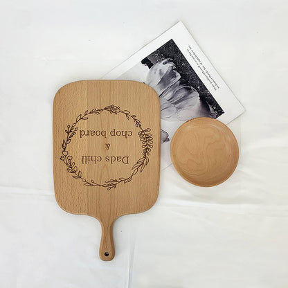 Custom-made cutting board with wedding-themed engraving, a perfect addition to kitchen decor for couples